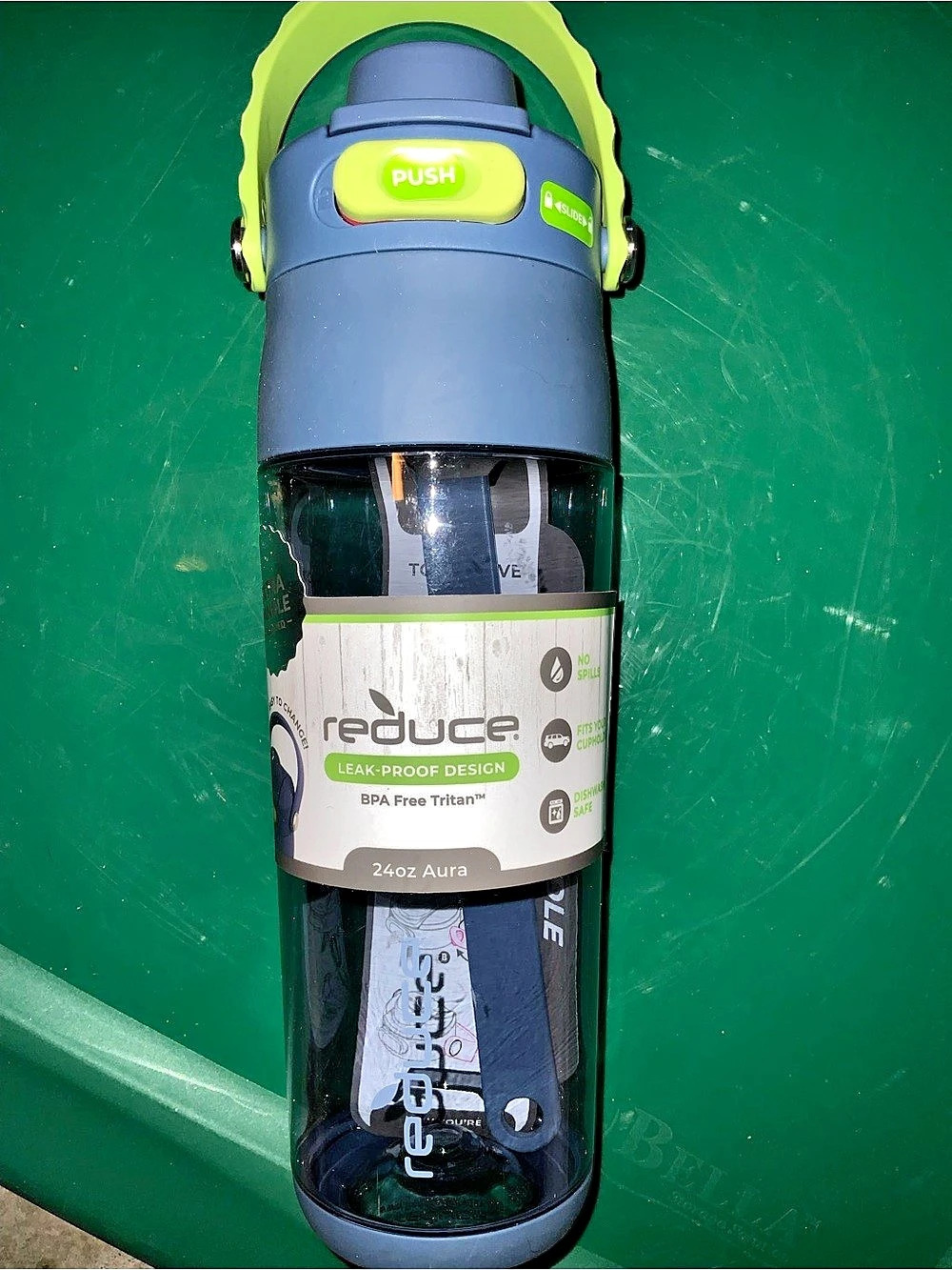 Reduce Aura Water Bottle 24oz Blue with Green handle.